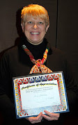 New Richmond Elementary School visual arts teacher Amy Cholkas has received . (cholkas award)