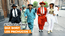 quatre Pachucos marchant dans la rue