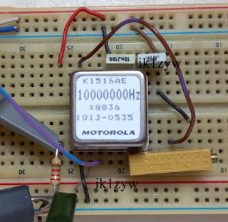 Testing a Motorola K1516AE TCXO on a breadboard.