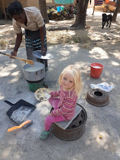 Hannah helping Virginia with cooking lunch.