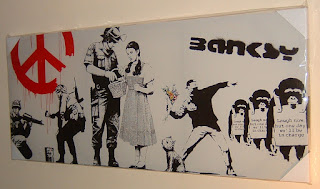 Graffiti on canvas soldier character by Banksy