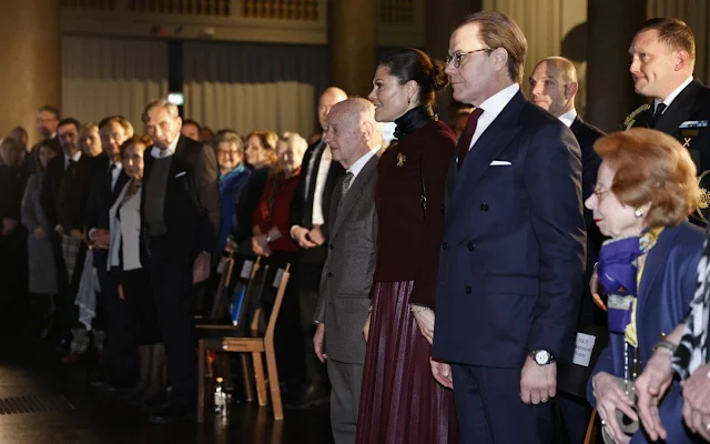 Crown Princess Victoria wore a burgundy pleated faux leather skirt from By Malina, and burgundy wool jacket