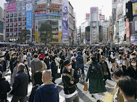 Japan's population falls while foreign residents rise to record.