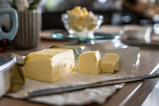 a block of butter, cut into slices