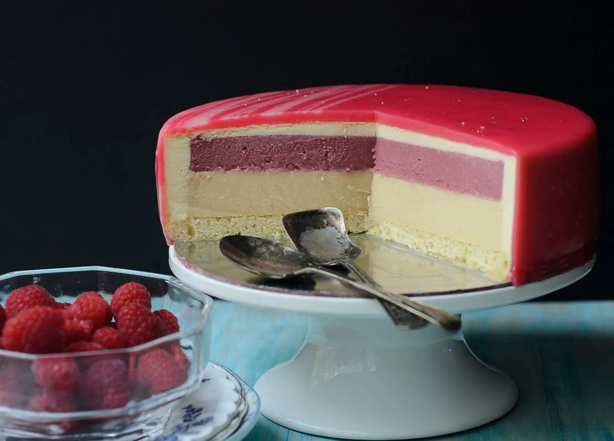 Sliced Mirror glazed Honey, Raspberry and White Chocolate Bavarois entremet photo