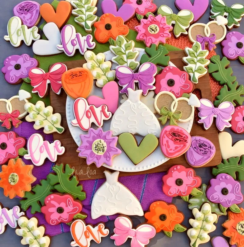 Brightly colored garden wedding flower chocolate sugar cookies