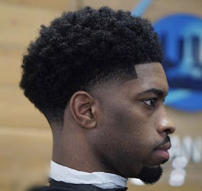 mid taper fade haircut black man