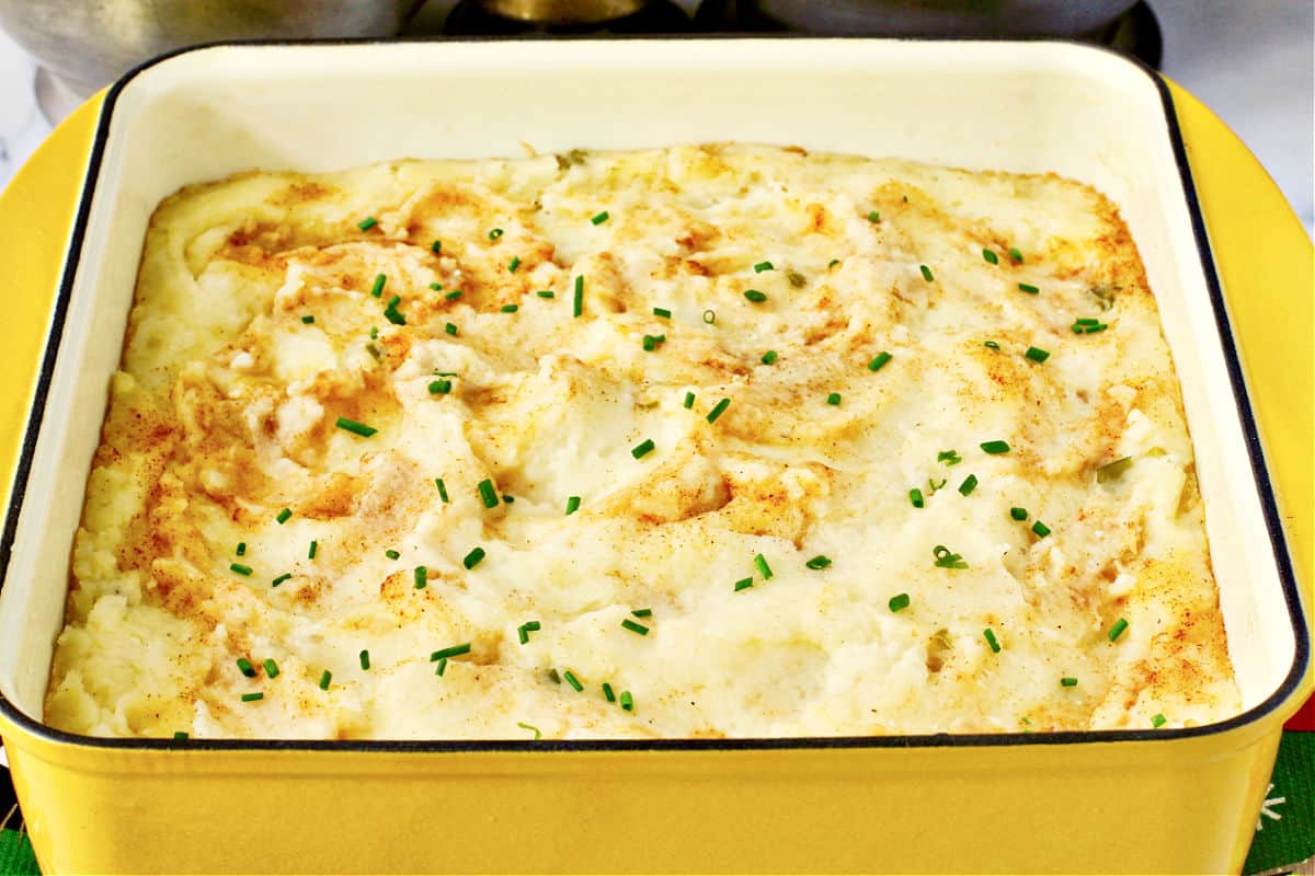 Make Ahead Mashed Potatoes in a yellow casserole dish.