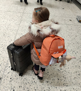 We are back at the airport and Rosie is helping