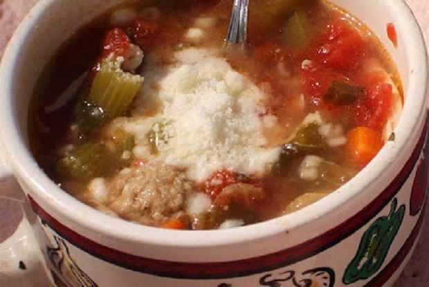 homemade vegetable soup topped with grated cheese