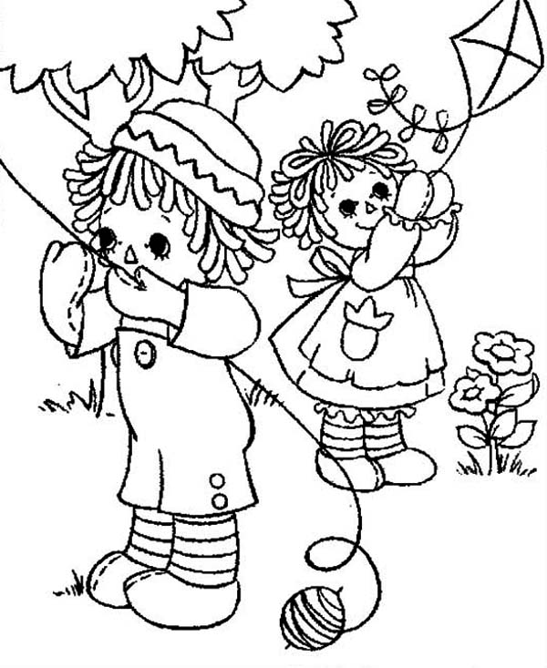Raggedy Ann And Andy Playing Kite
