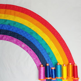 Bundle of Joy rainbow NICU baby quilt using Aurifil thread