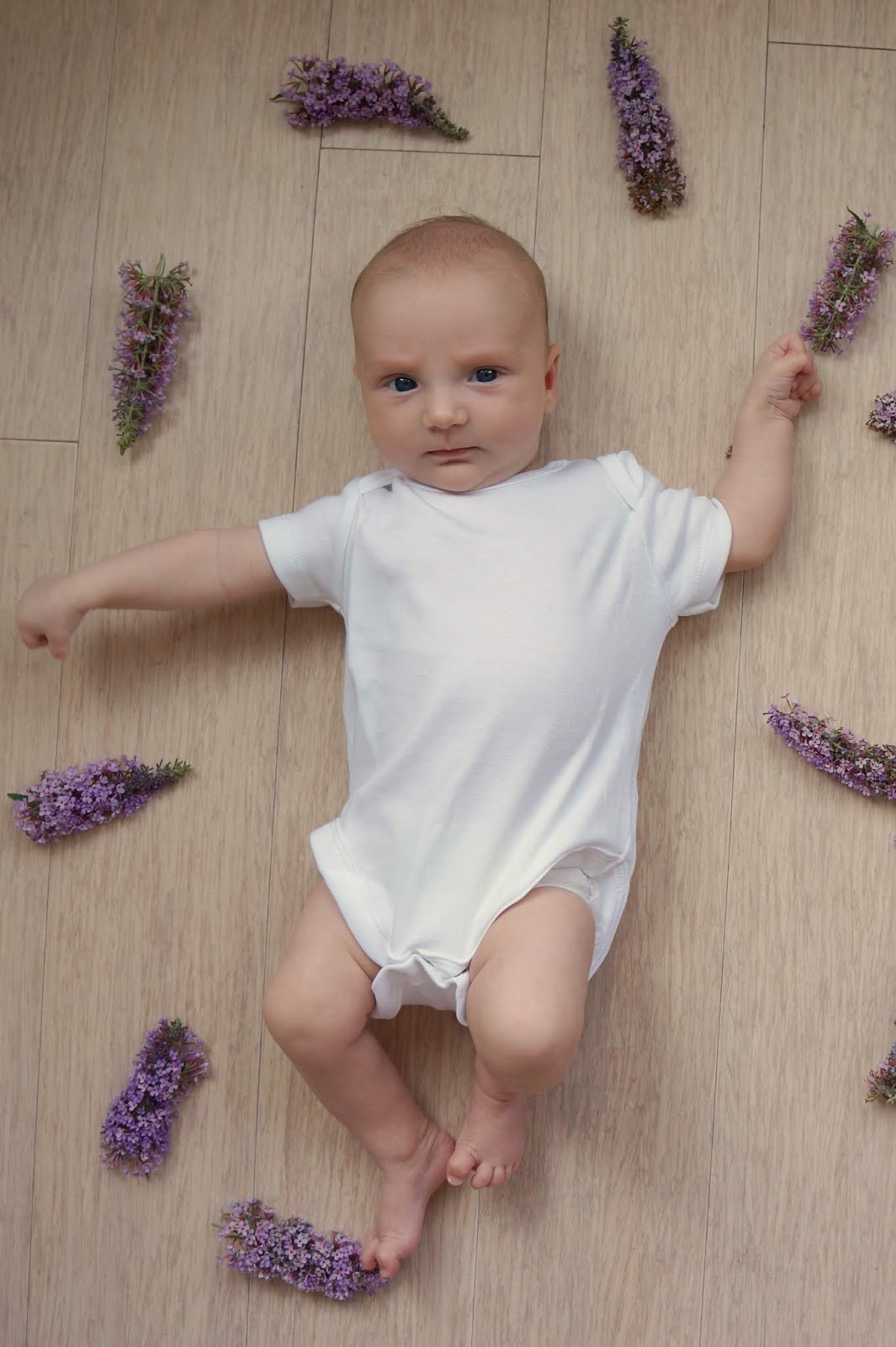 baby with flowers