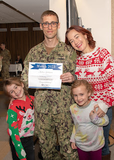 Navy Lt. Michael Goldstein celebrates Match Day 2023 with his family. (USU Photo)