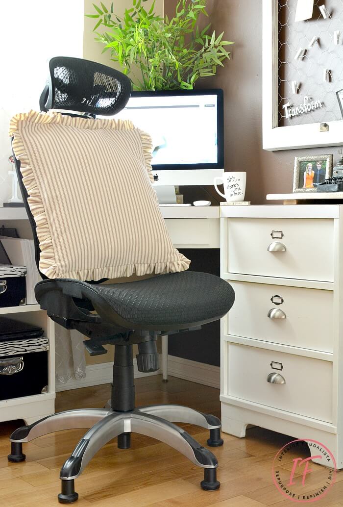 A ticking fabric office chair pillow for added back support for those who are vertically challenged.