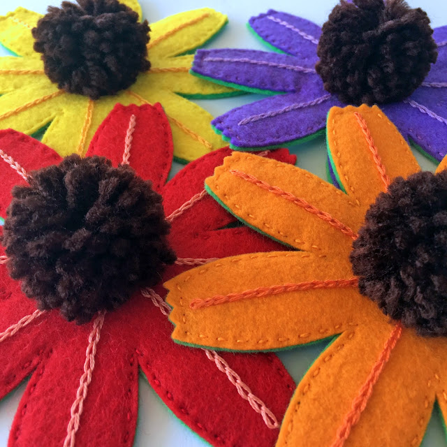 felt flowers with pompom centerse