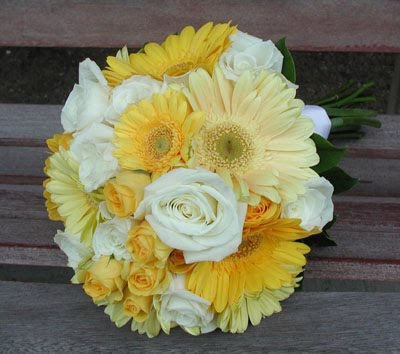 and butter yellow gerbera daisies with pure white roses wedding bouquet