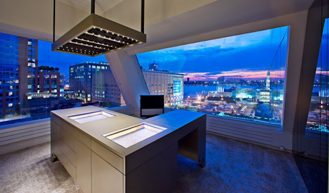 Photo of working room with incredible view in one of the modern New York penthouses
