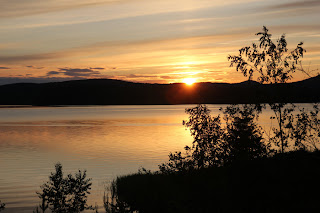 Solnedgång över havsvik i Ångermanland