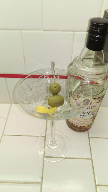 The Phenomenal, classic martini includes both an olive and a twist!