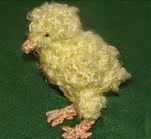 http://www.ravelry.com/patterns/library/fuzzy-the-newborn-chick