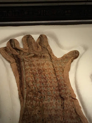 photo of faded embroidered glove