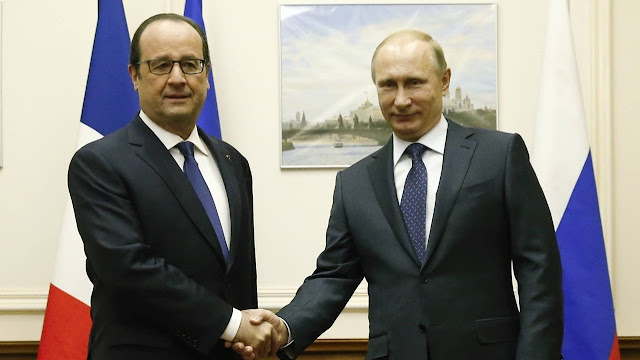 Putin sai do ostracismo e volta ao cenário como 'Carlos Magno' salvador da mão do socialista Hollande.
