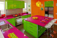 Colorful kitchen design with island in pink green and orange colors