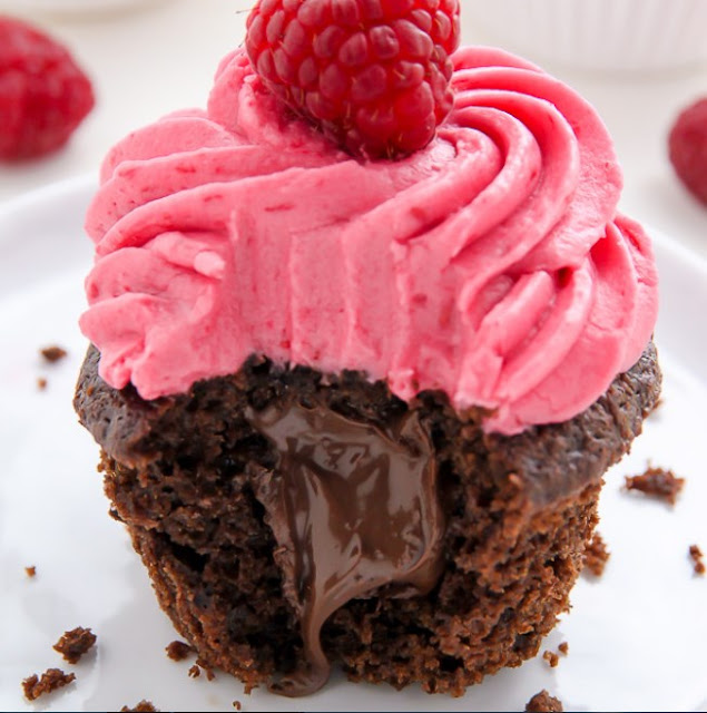 Nutella Stuffed Chocolate Cupcakes with Raspberry Frosting 