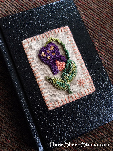 Folksy Flower Punch Needle On Journal by ThreeSheepStudio.com