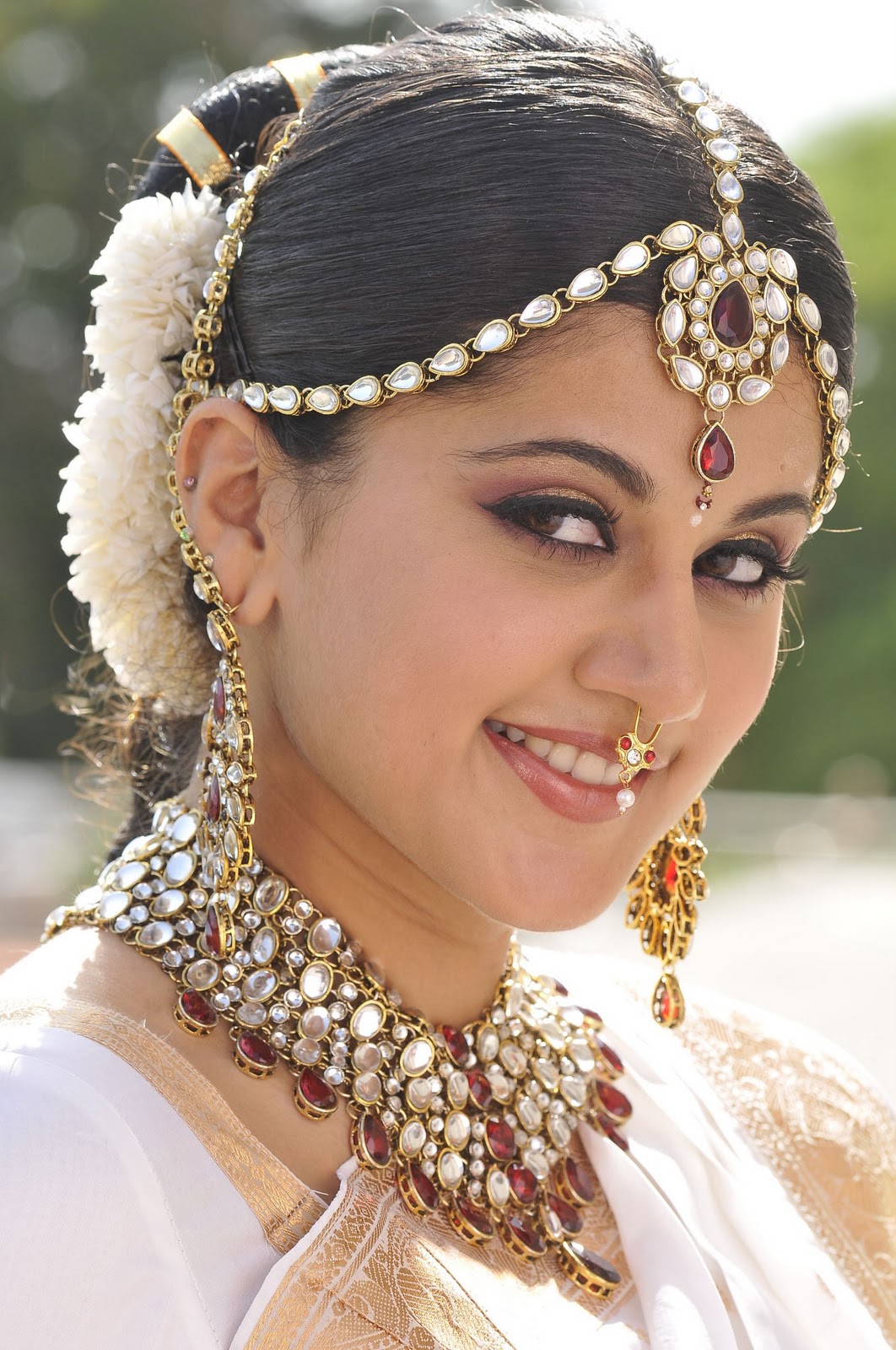 very cute actress taapsi in bridal and traditional style