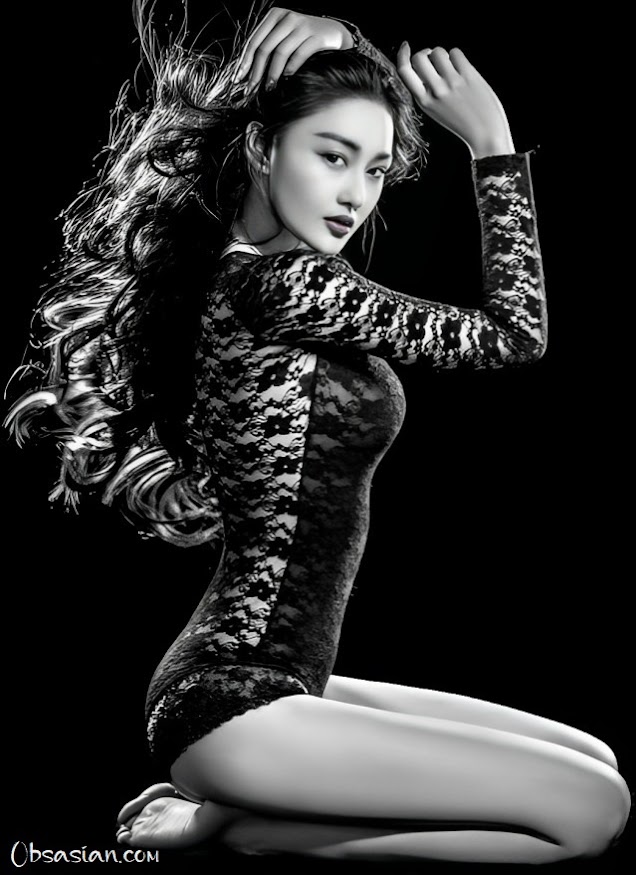 Zhang Xinyu 张馨予 sat in black with long hair
