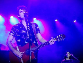 Blake Anderson Hanley singing in the stage