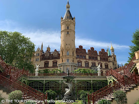 The ircon-clad decorated orangery of a castle in Romantic historicism style.