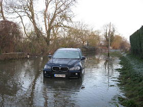 Covering a BMW driver's embarrassment at being stranded in a flood!