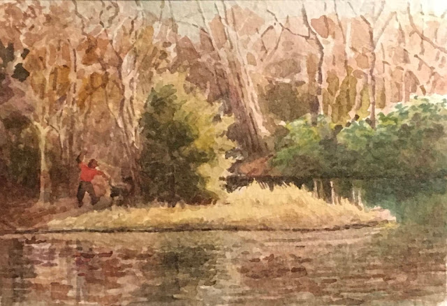 Watercolor painting of park scene with sunlight falling on yellowish grass against dark woods and green laurel bushes. A man in a red jacket is throwing a ball for his dog. Scene is reflected in gently rippling lake water.