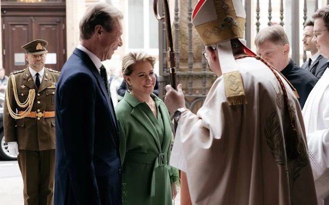 Grand Duchess Maria Teresa wore a green belted wool coat from Belgian fashion house Natan