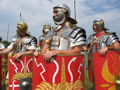 Reenactors from Legion III Cyrenaica with the armor and shields of a Roman legion.