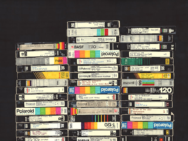 VHS tapes stacked in three columns