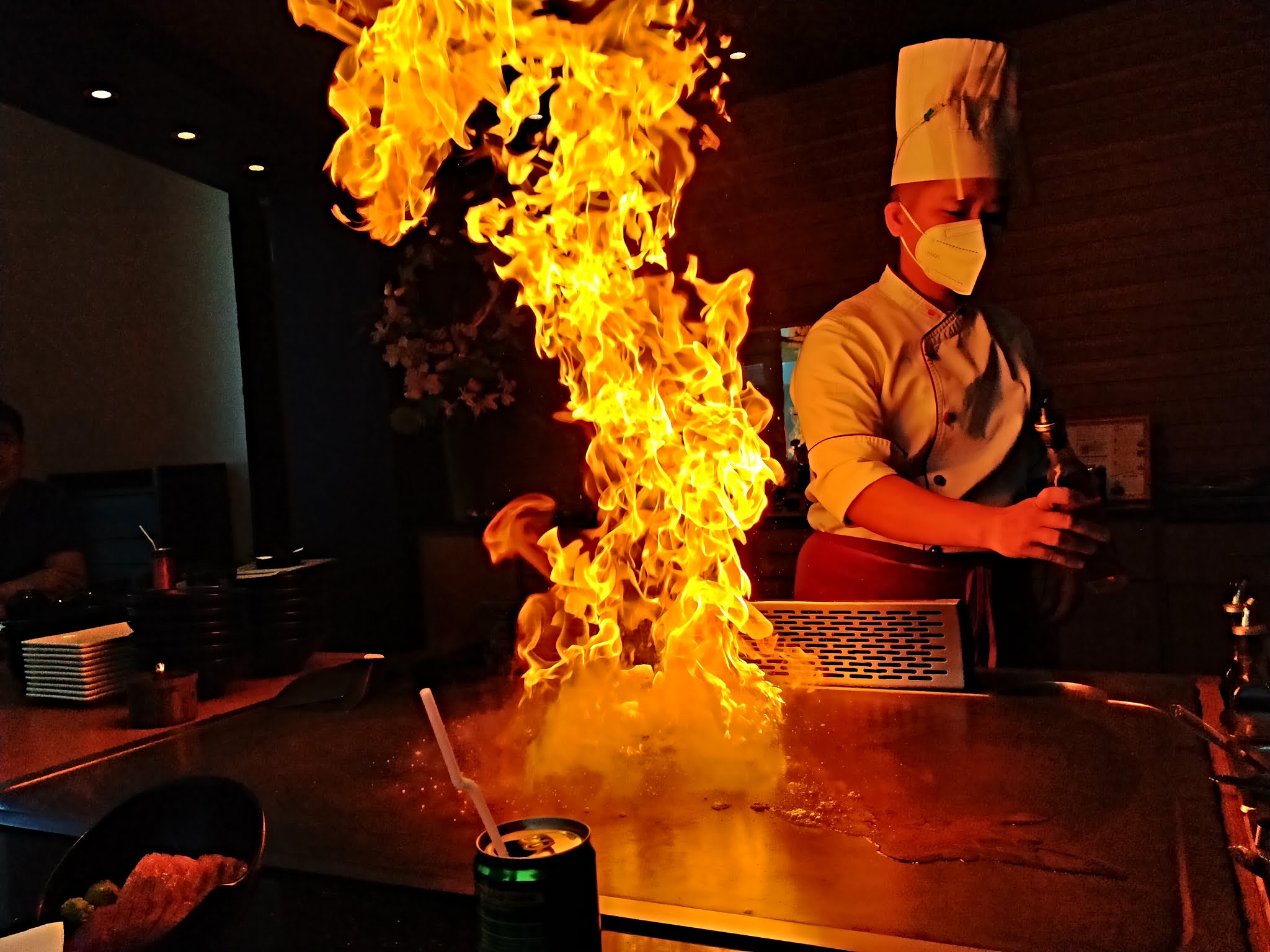Our chef prepares the Flambe Citrus Roll
