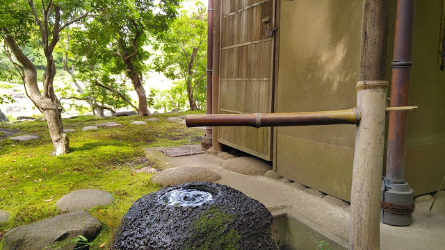 Bamboo water tap at Isui-en