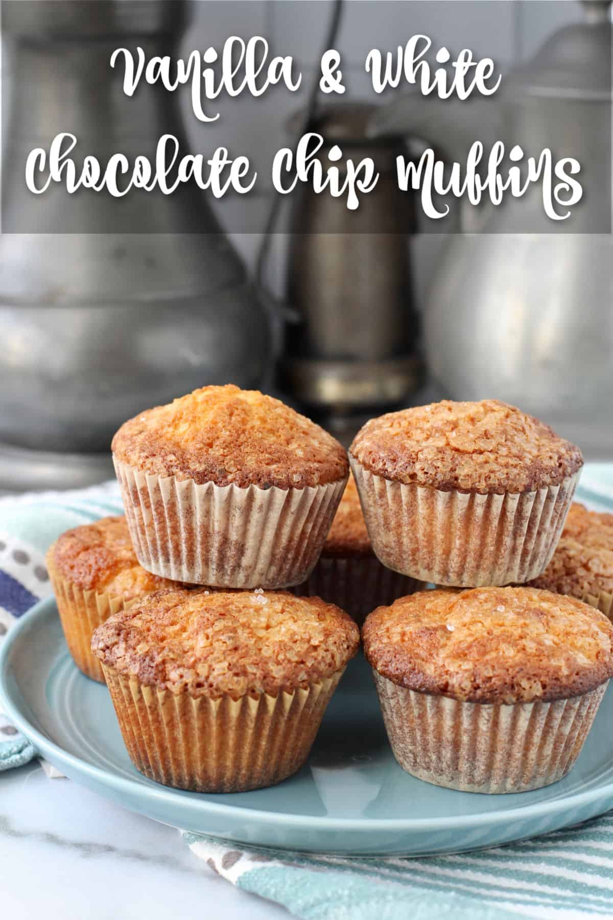 Vanilla White Chocolate Chunk Muffins on a blue plate.