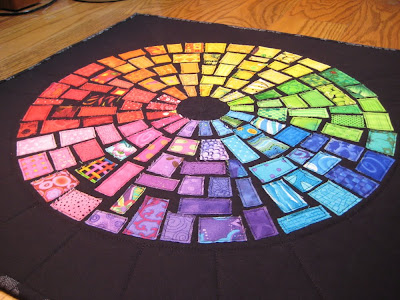 Finished the color wheel ticker tape quilt.