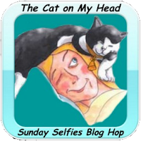 http://thecatonmyhead.com/astrids-springtime-selfie