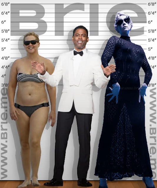 Chris Rock standing with Amy Schumer and Gwendoline Christie