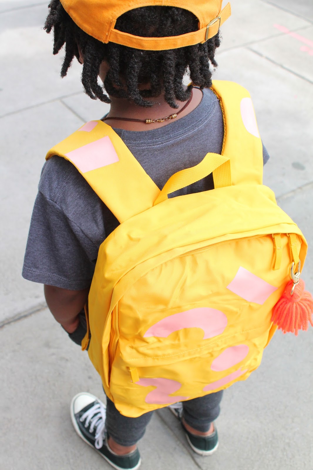 Make a DIY geometric kids backpack with iron on vinyl for back to school