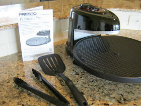 Presto Pizzazz Plus Rotating Oven with Instruction Book. Utensils not included.