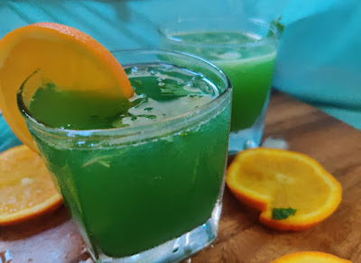 beautiful aqua colored summer drink for beach lovers