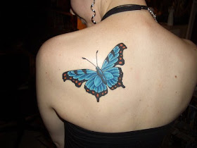 butterfly tattoos on upper back. Butterfly tattoo on her upper