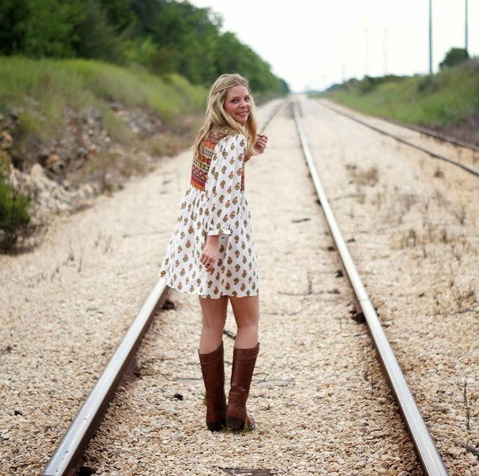 printed shift dress with cowgirl boots